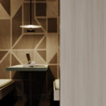 Renderafbeelding van een detailafbeelding van een kantoorruimte waarin de wandafwerking is uitgewerkt in de LS92 Matrice en tafelblad in PM6069 Clover